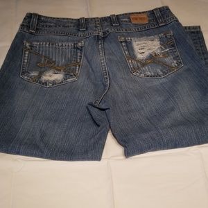 Distressed denim capris